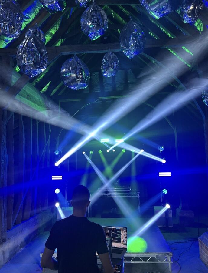 Avolites lighting desk with crossing beam show