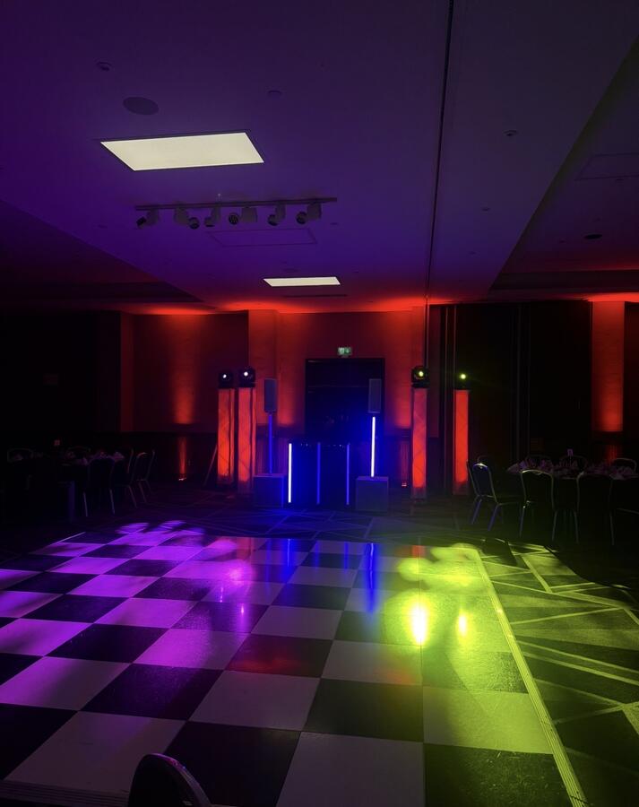 Checkered dance floor with coloured lighting